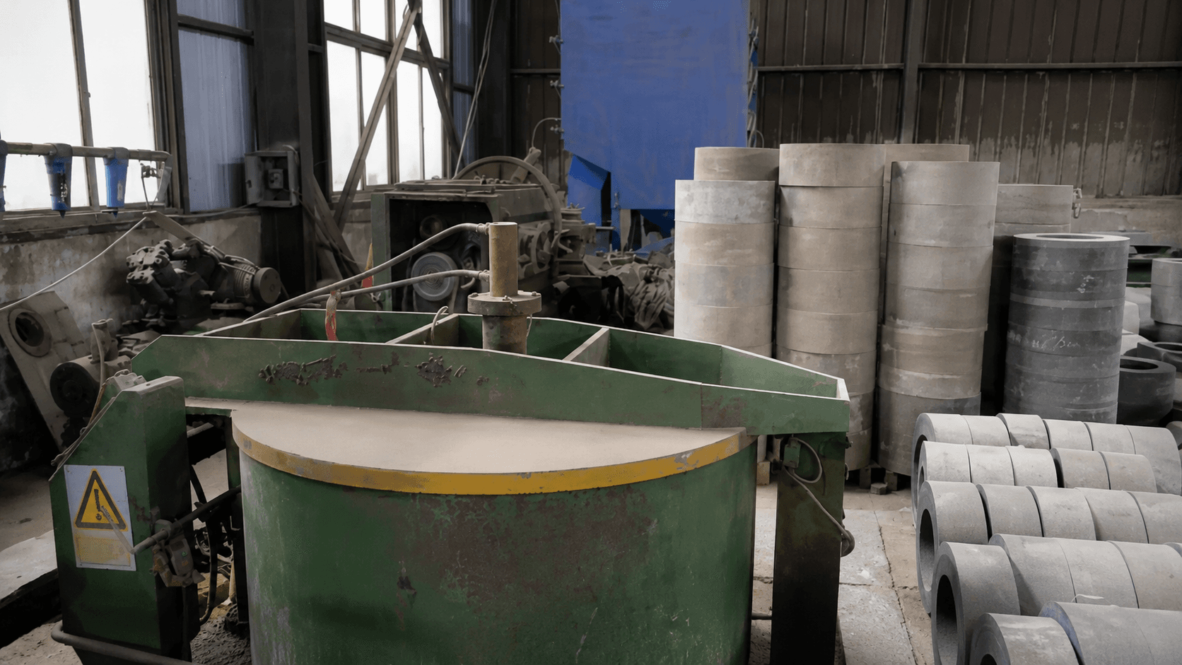 Grinding wheel pressing and forming process at Youlin Abrasive manufacturing facility